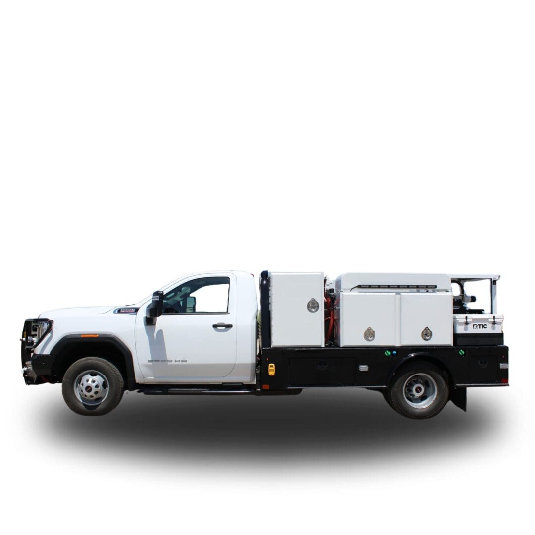 White utility truck with service boxes.