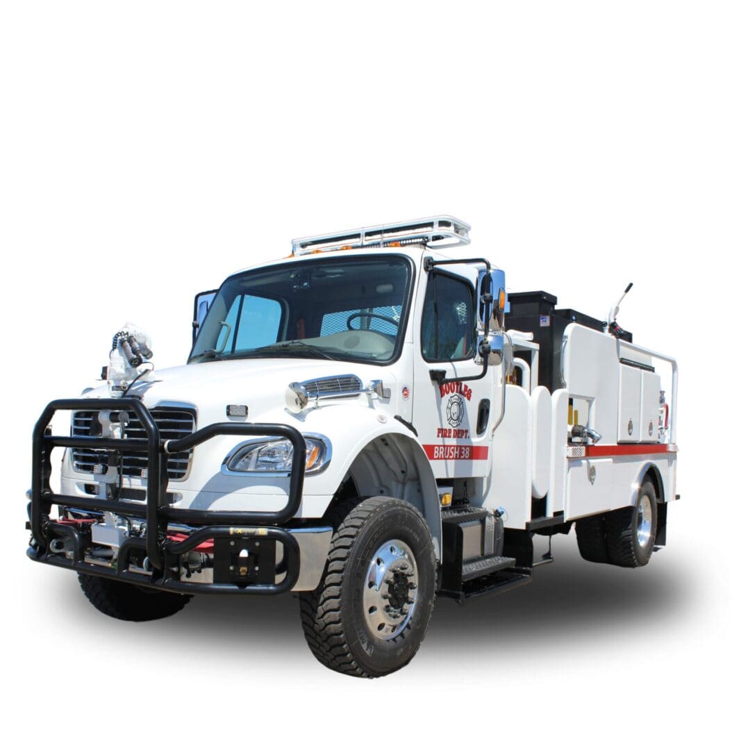 White fire truck with a brush guard.