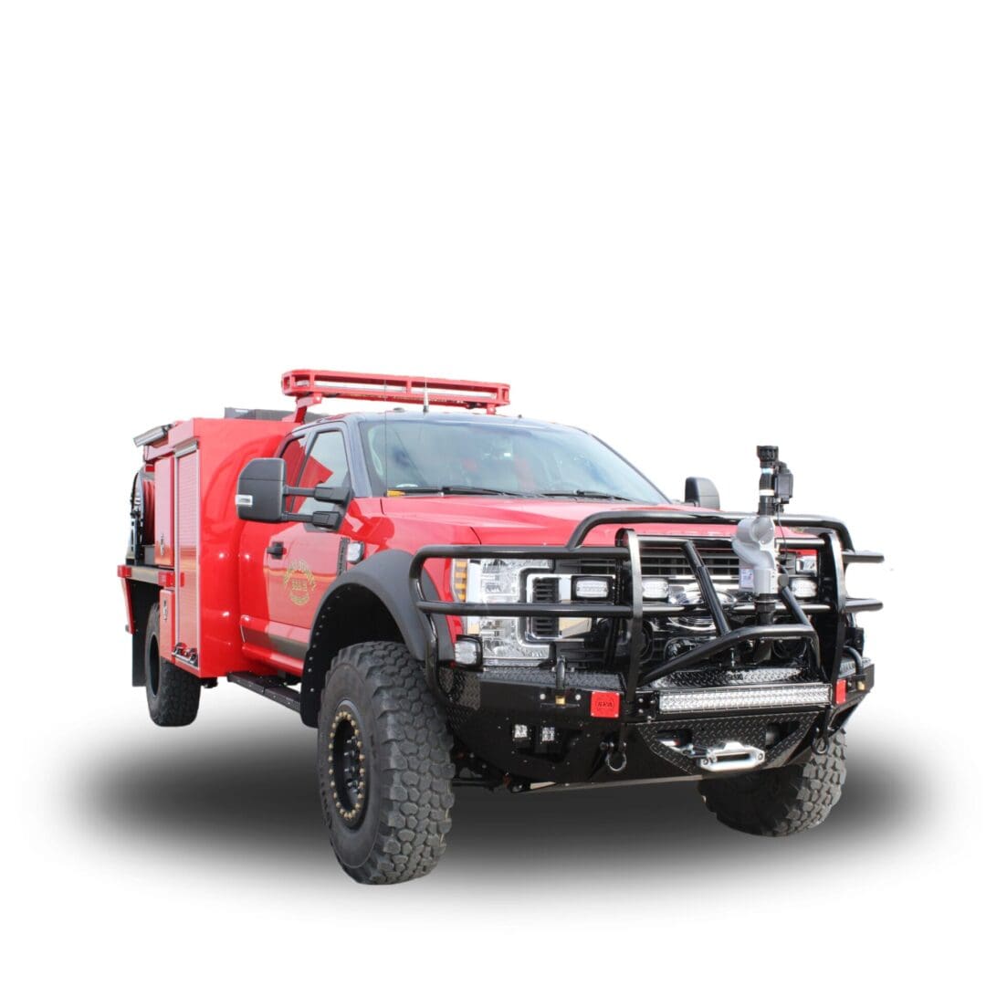 Red fire truck with a brush guard.