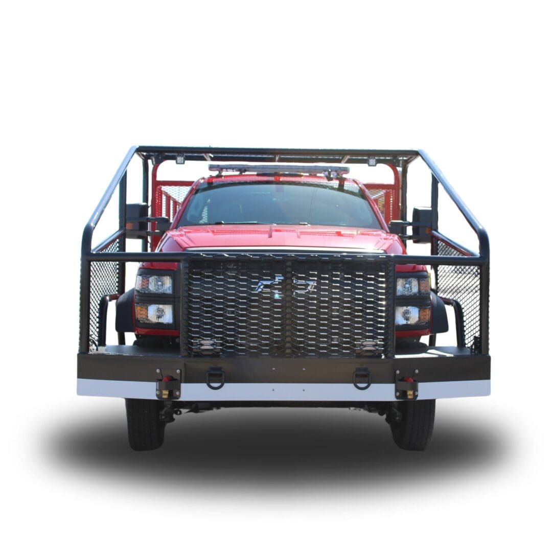 Red truck with black cage and grill.