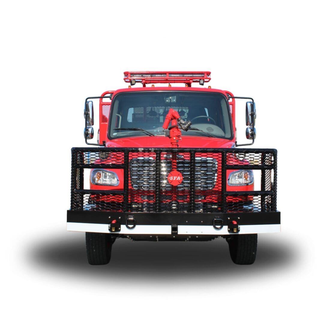 Red fire truck with a grill guard.