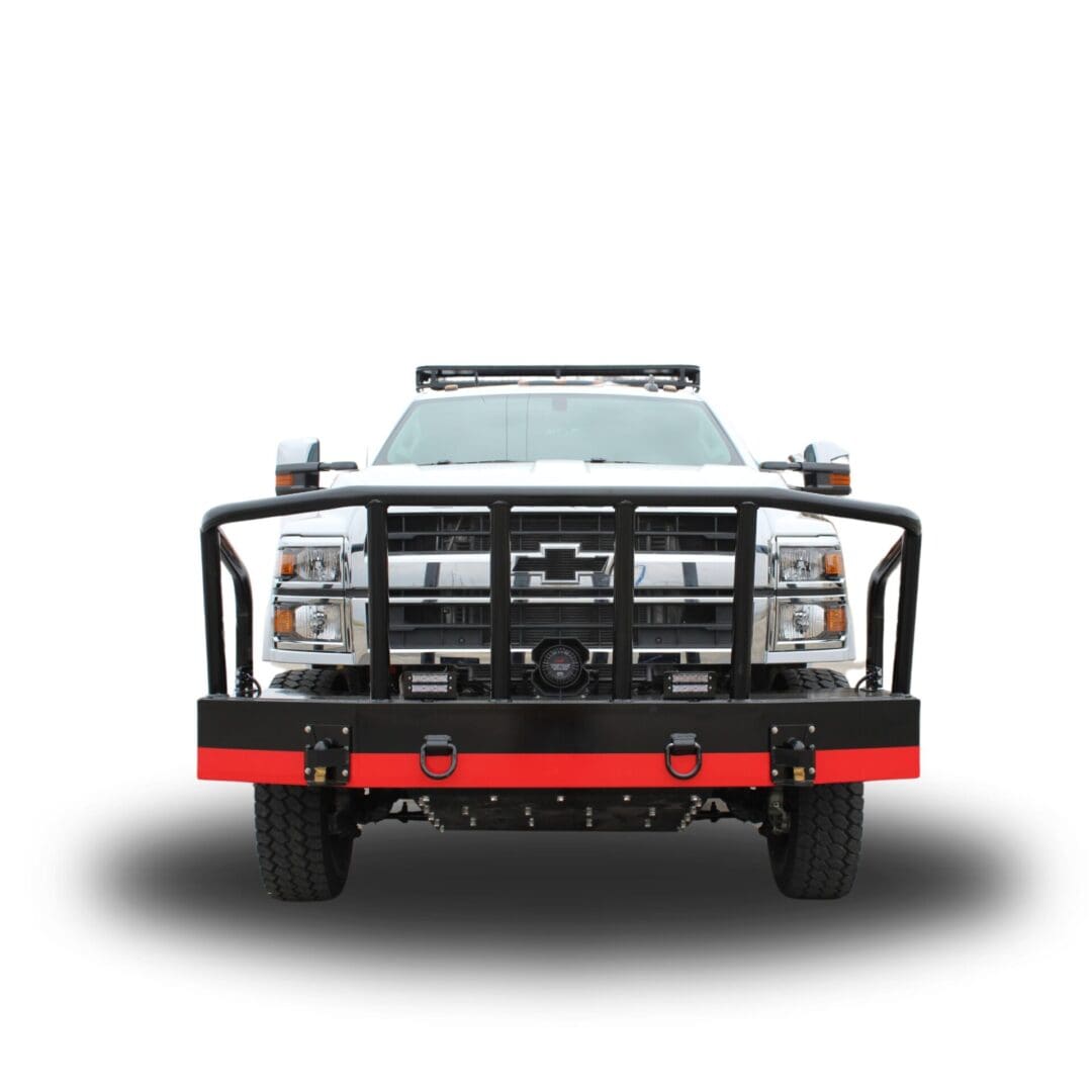 White truck with black grill and bumper.