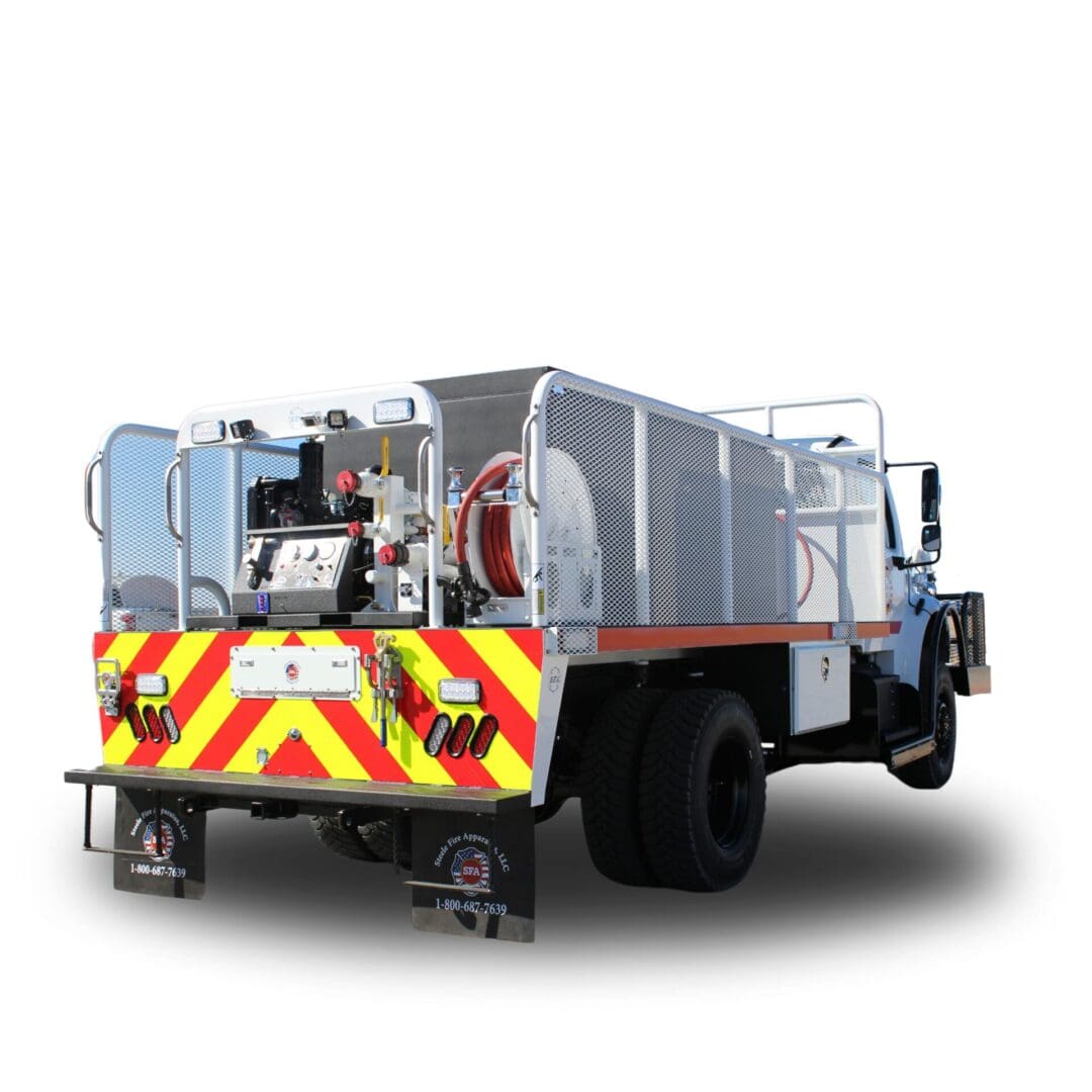 White fire truck with hose reel and lights.