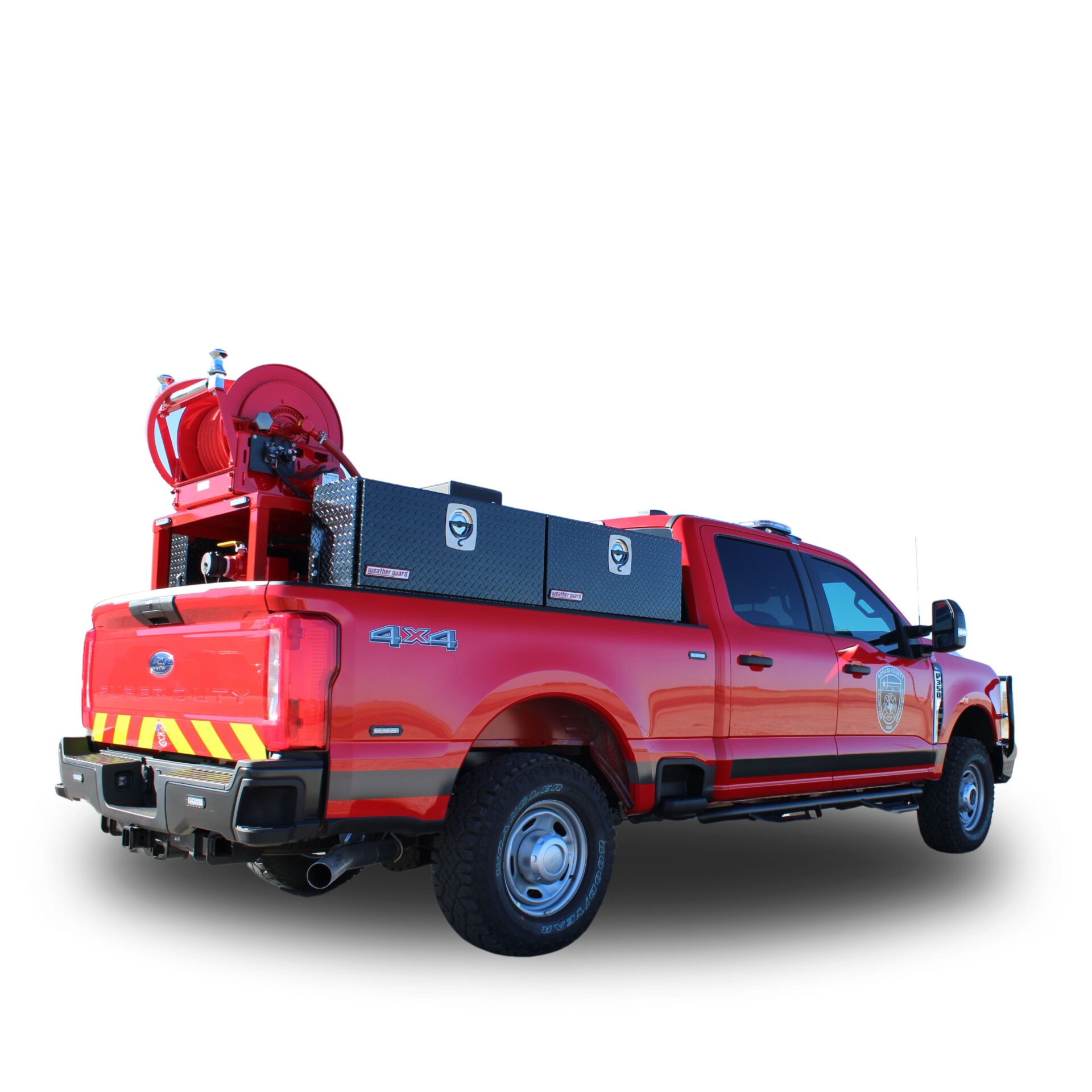 Red fire truck with hose reel and toolbox.