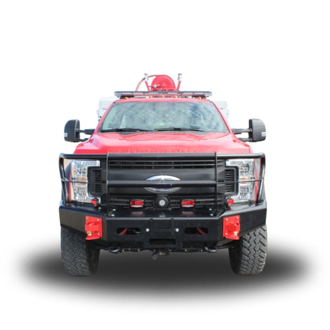 Red fire truck with a black grille.