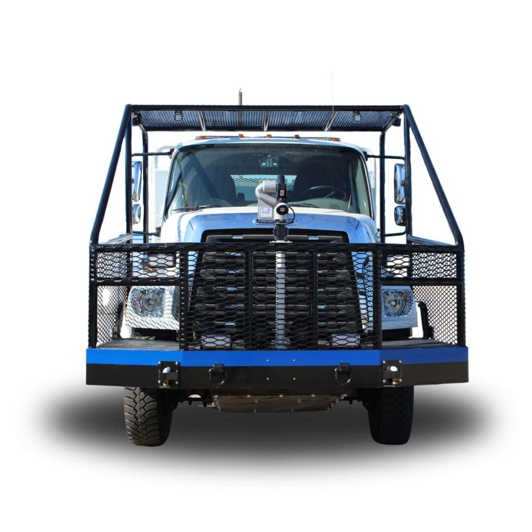 White truck with a black cage and blue bumper.