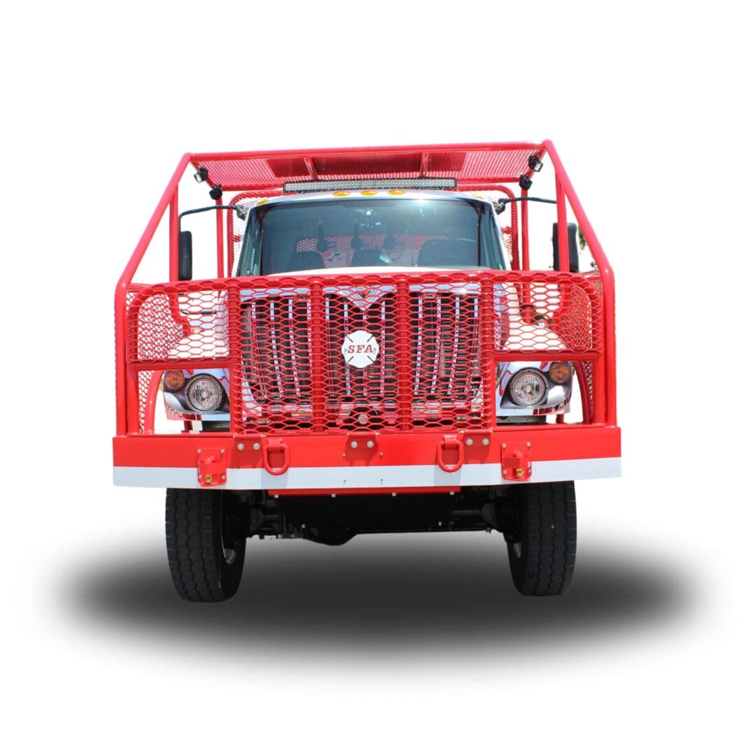 Red fire truck with a grill guard.