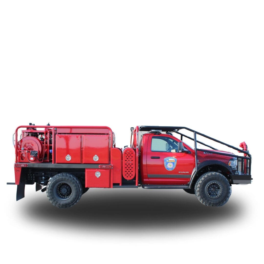 Red fire truck with water tank and hoses.