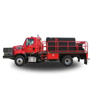 Red fire truck with black tank and cage.