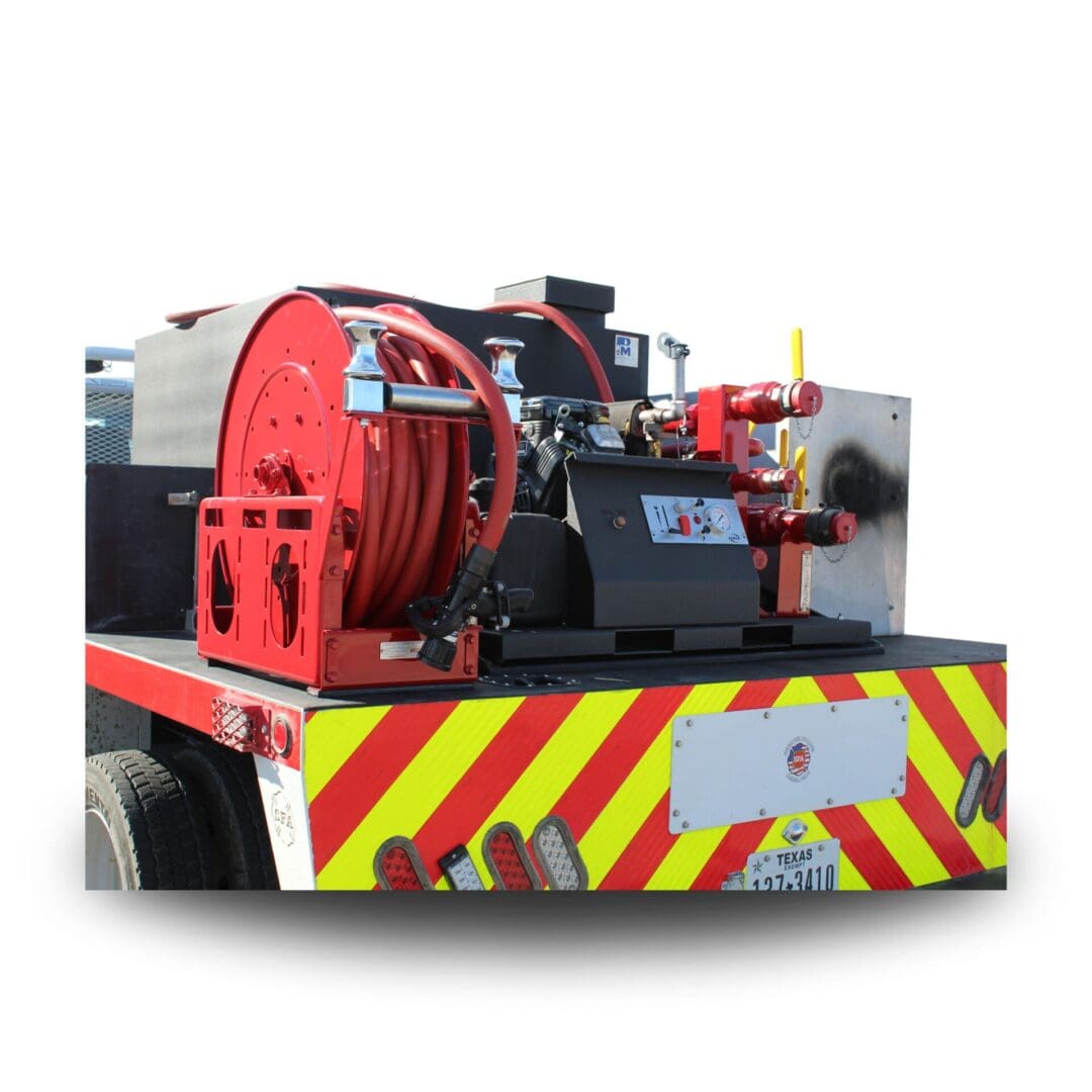 Fire truck with hose reel and lights.