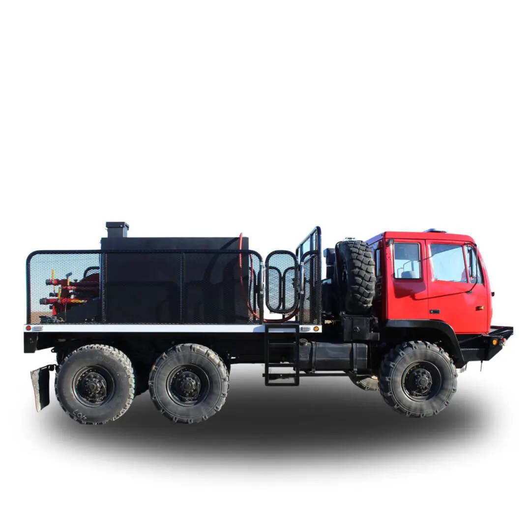 Red truck with black tank and cage.