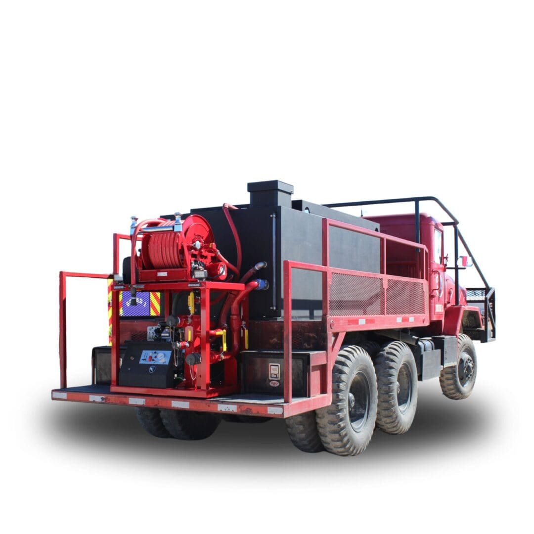 Red fire truck with hose reel.