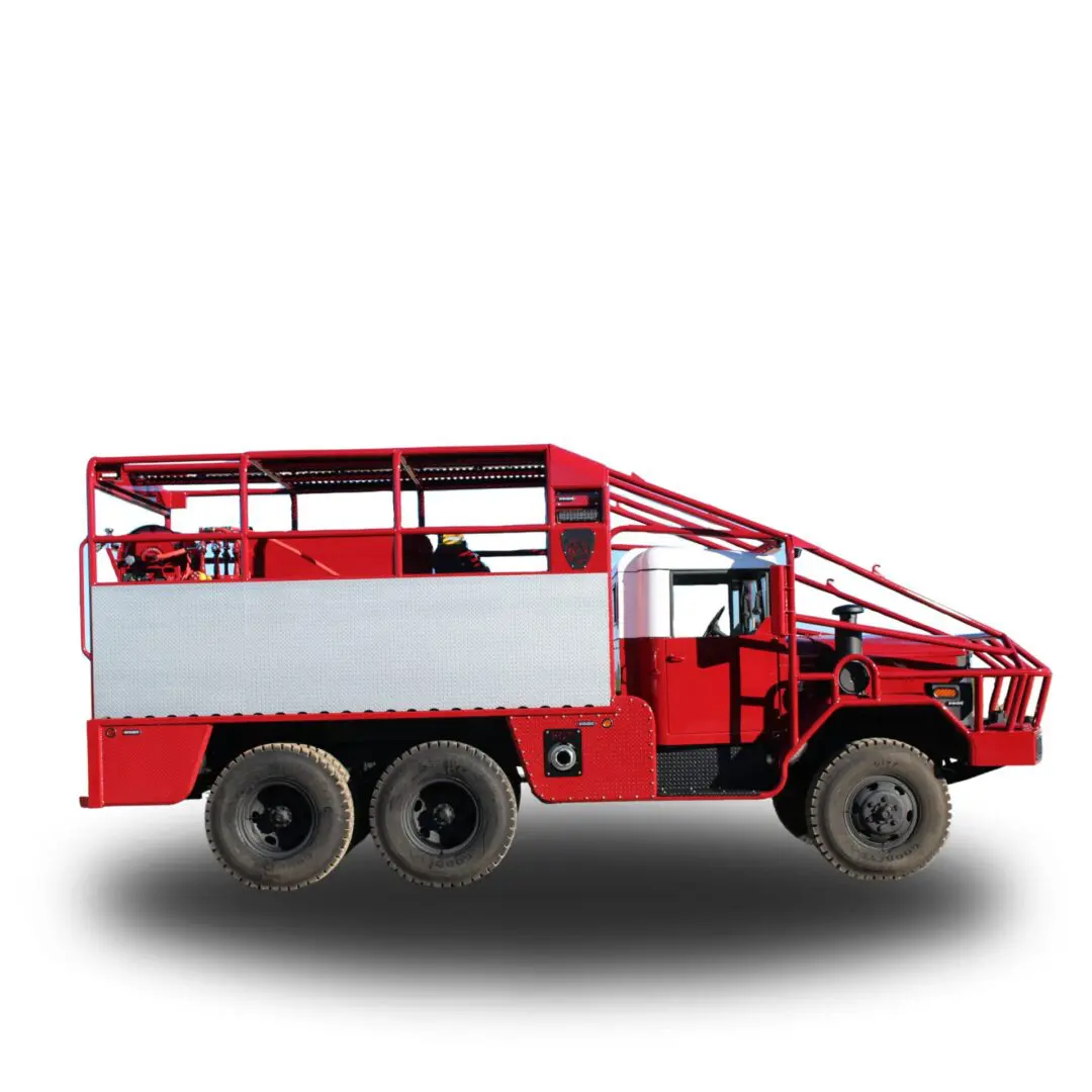 Red fire truck with caged bed.