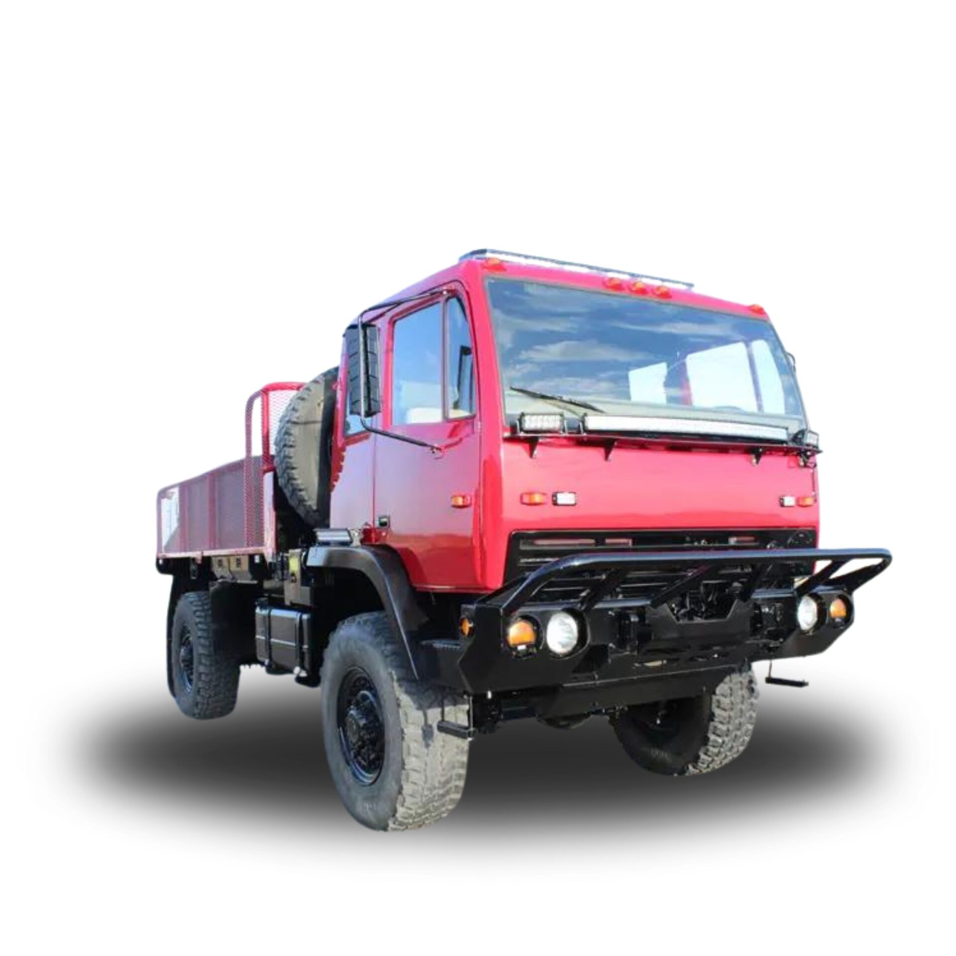 Red heavy duty truck with black bumper.