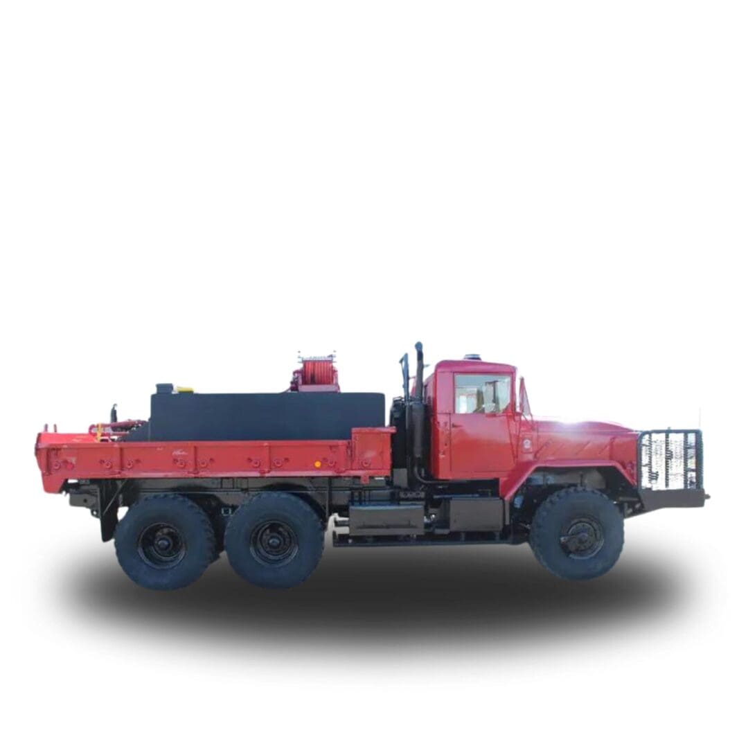 Red flatbed truck with a water tank.