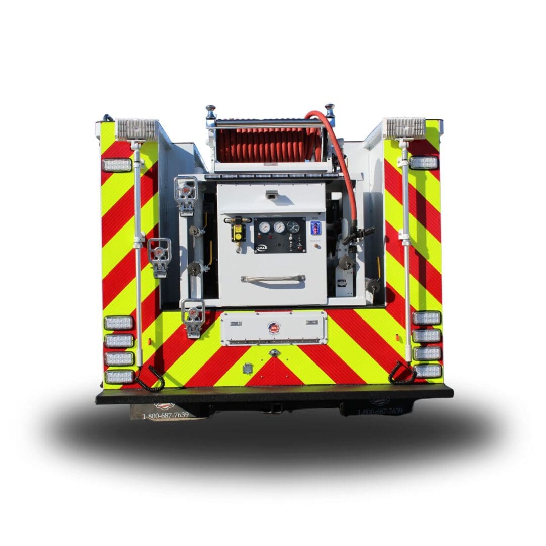 Rear view of a fire truck with red and yellow stripes.