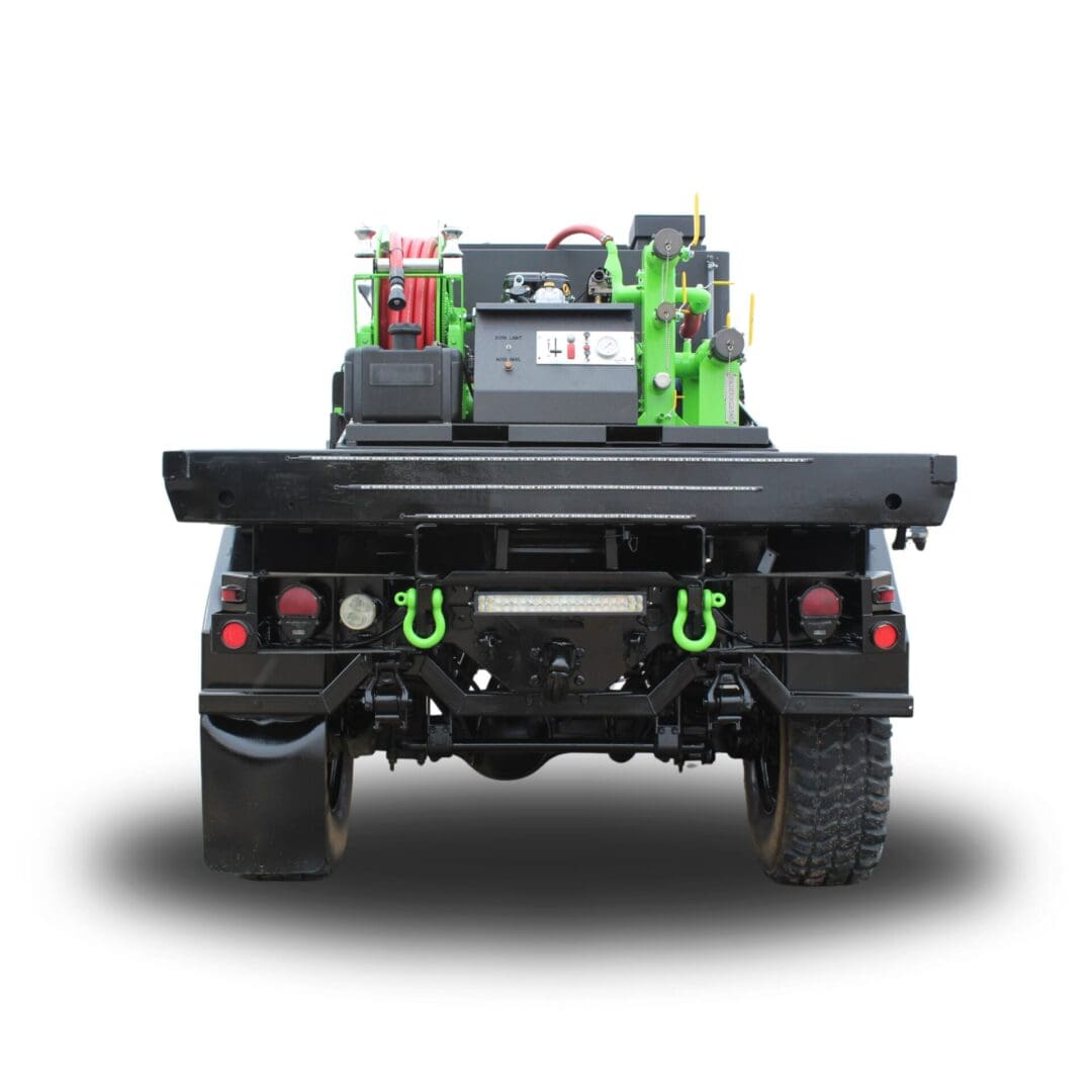 Black truck with green and red details.