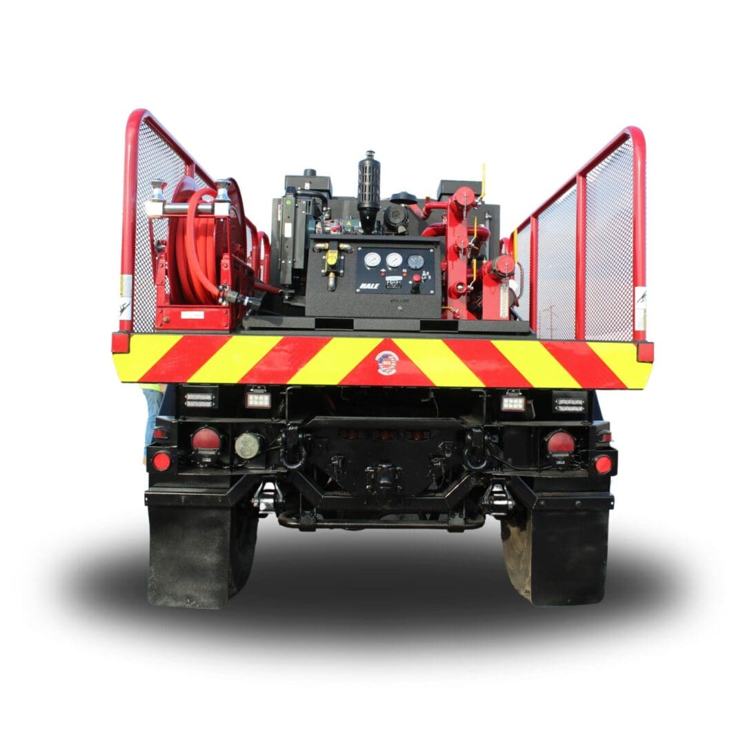 Rear view of a fire truck with a hose reel.