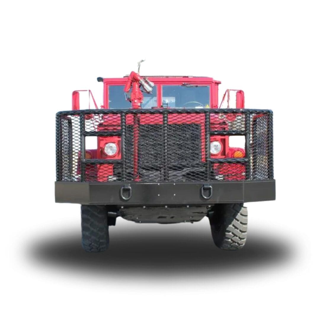 Red fire truck with a black grill.