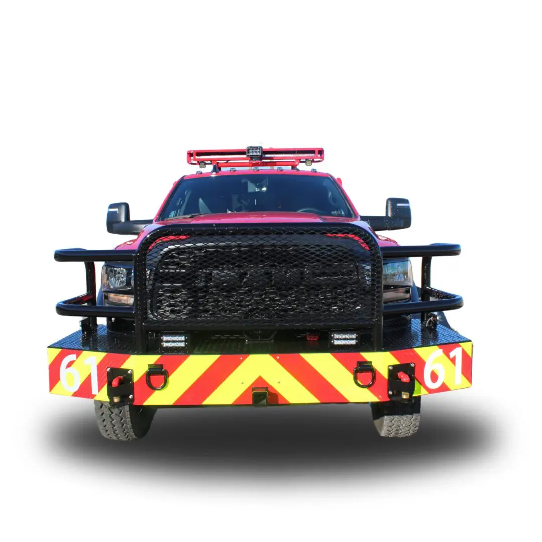 Red fire truck with black grille and bumper